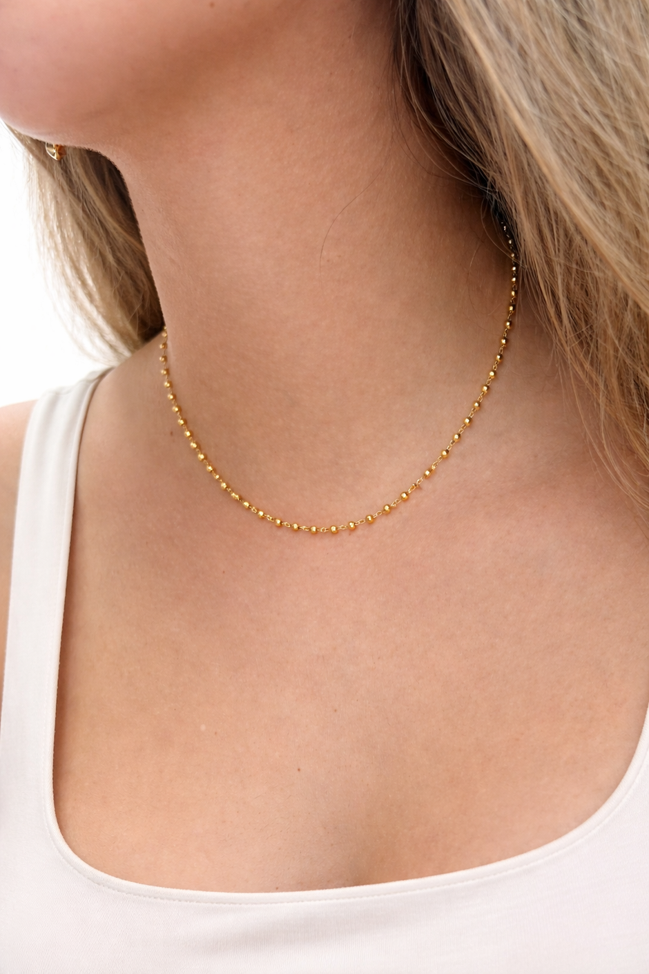 Collar mini esferas doradas