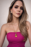 Collar con dije champagne/morado
