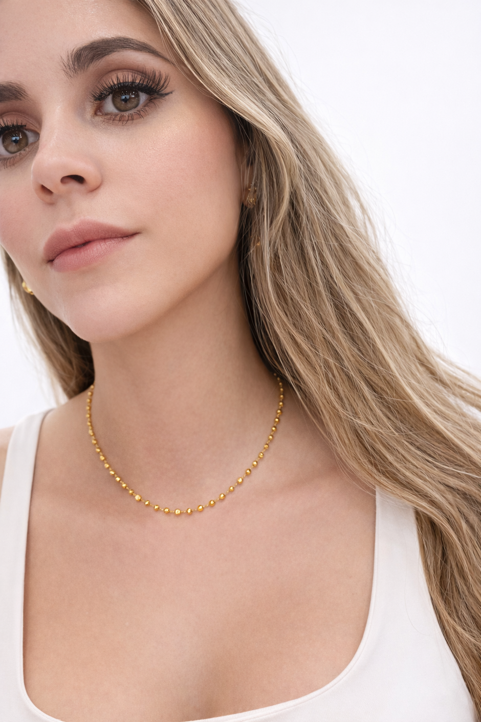 Collar mini esferas doradas