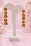 Aretes largos de cristal champagne