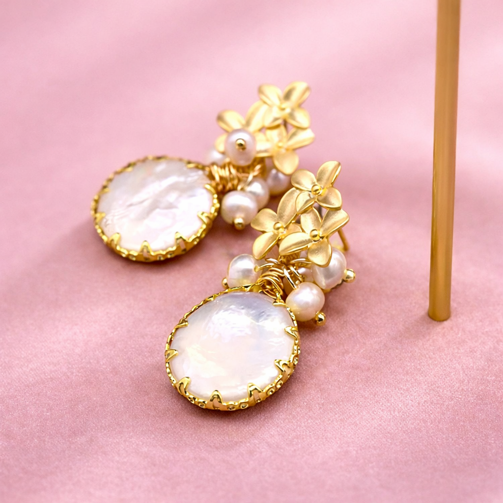 Aretes con perla redonda