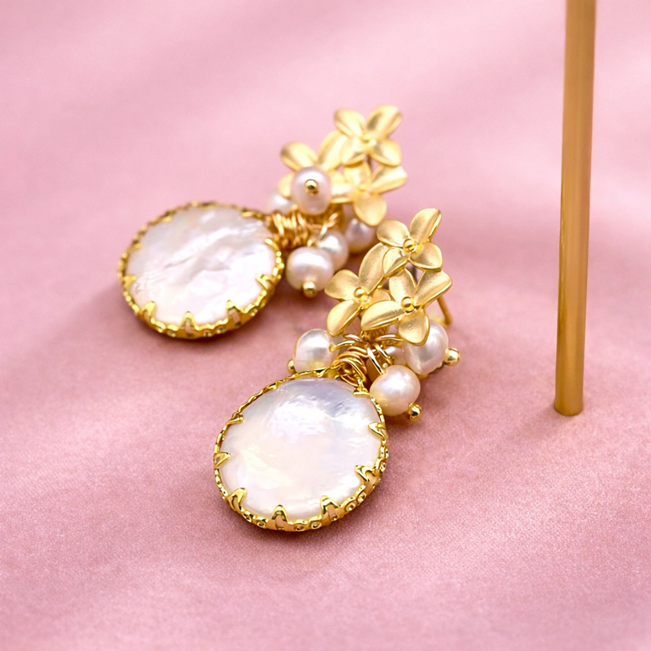 Aretes con perla redonda