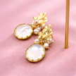 Aretes con perla redonda