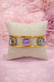 Pulsera multicolor giratoria