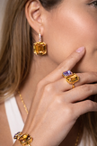 Anillo de cristal champagne/morado