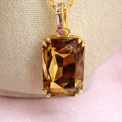 Collar con dije champagne/morado