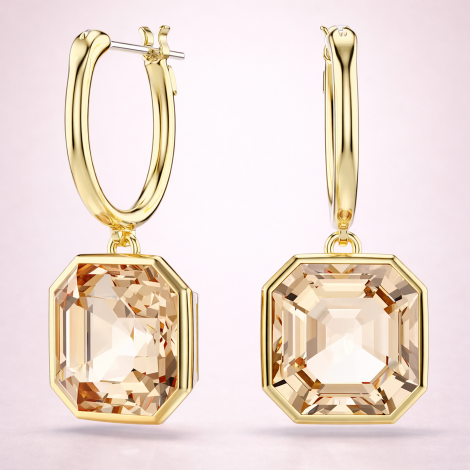 Aretes dorados con piedra corte cushion en tono miel.