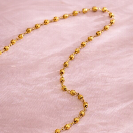 Collar mini esferas doradas