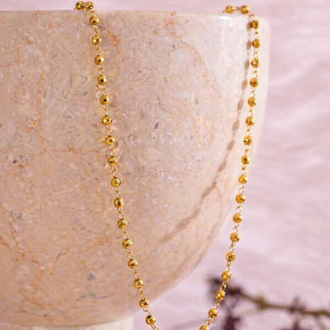 Collar mini esferas doradas