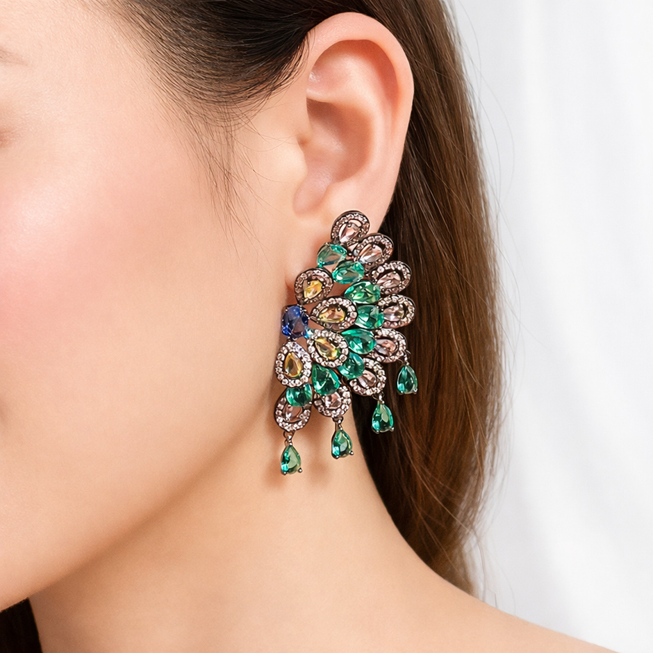 Aretes PavoReal